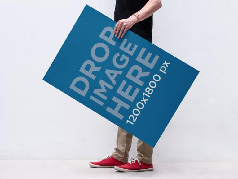 Man holding Poster in Hand Mockup
