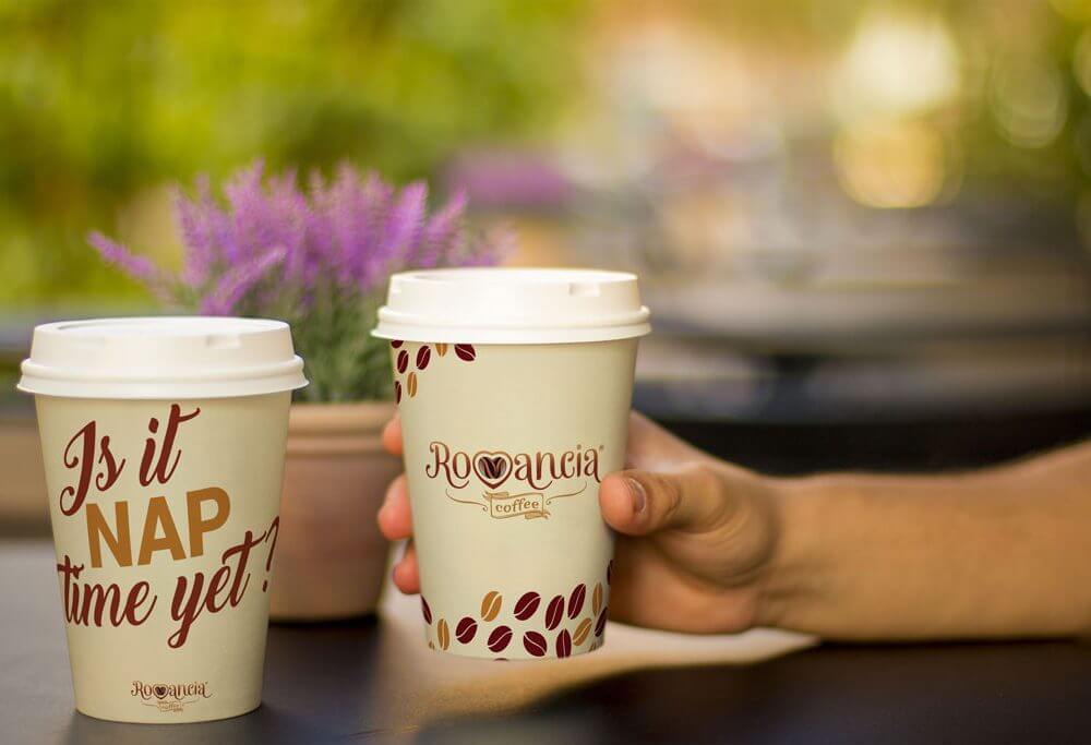 Holding a Coffee Cup Mockup