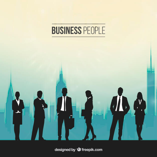 Silhouettes of people in a busy office
