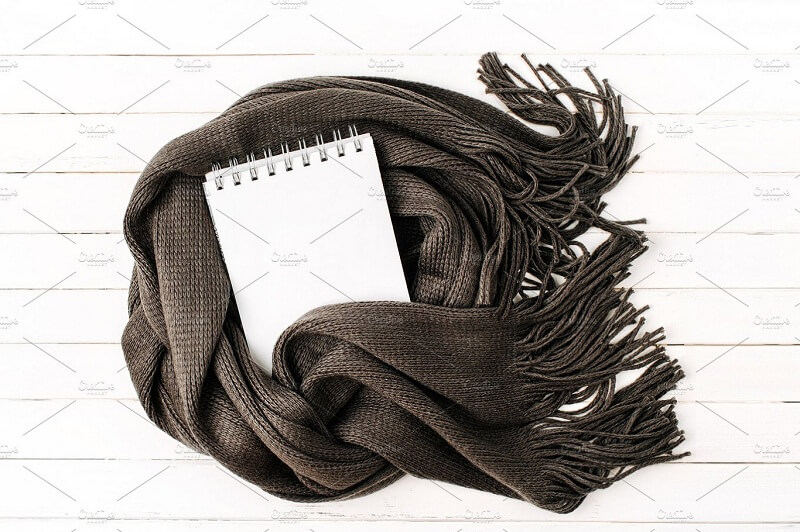 Empty card wrapped in scarf